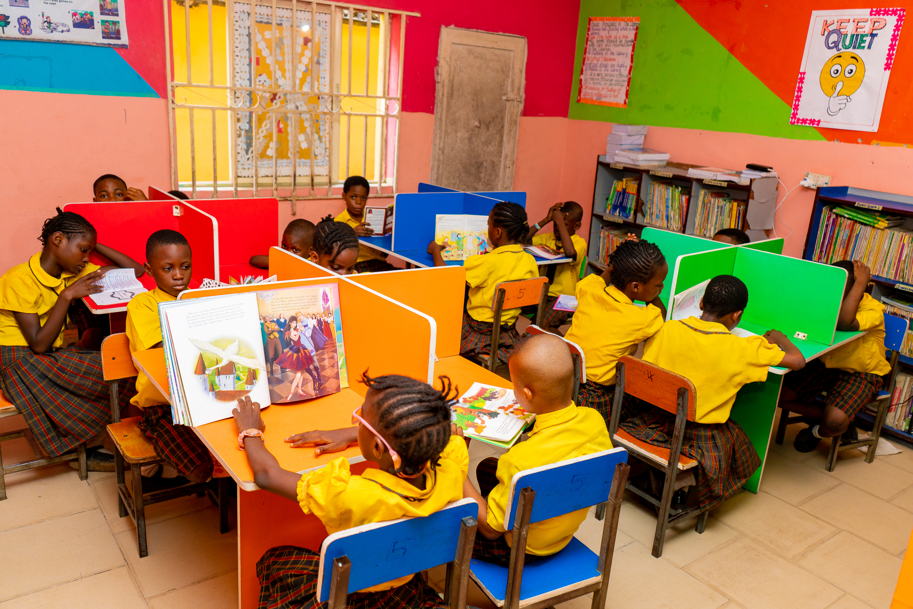 A cross section of pupils studying in the school library