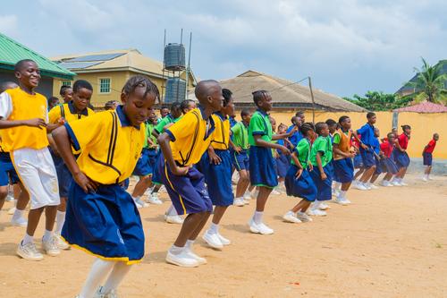 College students doing sports exercises
