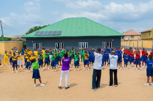College students doing sports exercises