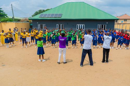 College students doing sports exercises