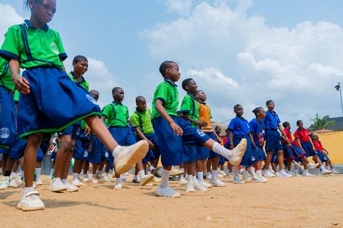 College students doing sports exercises