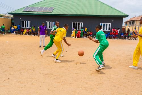 College students playing basketball