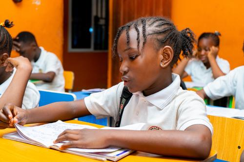 A female college student studying in the classroom
