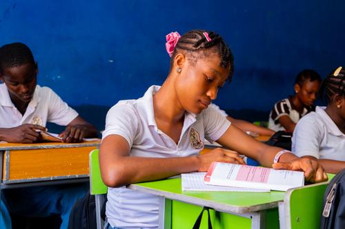 A female college student studying in the classroom