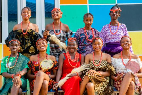 College students in creative arts traditional attire
