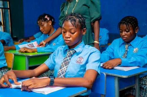 College students reading in the classroom