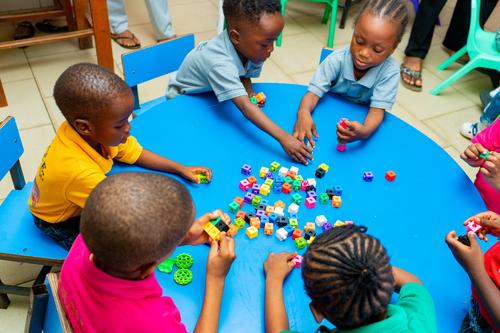 Nursery pupils learning with educational toys