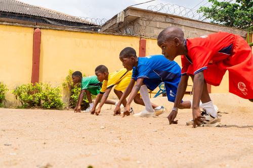 Primary male pupils racing