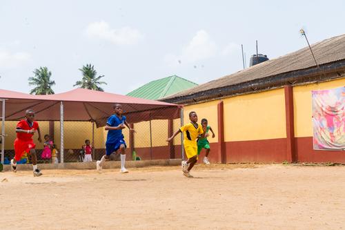 Primary male pupils racing