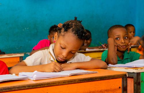 Primary pupils learning in the classroom