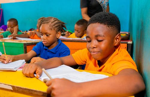 Primary pupils learning in the classroom
