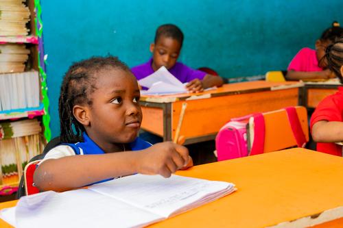 Primary pupils learning in the classroom