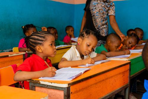 Primary pupils learning in the classroom