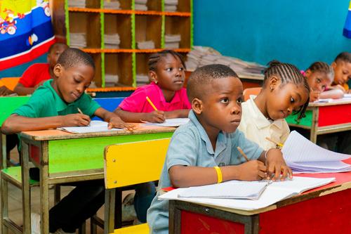 Primary pupils learning in the classroom