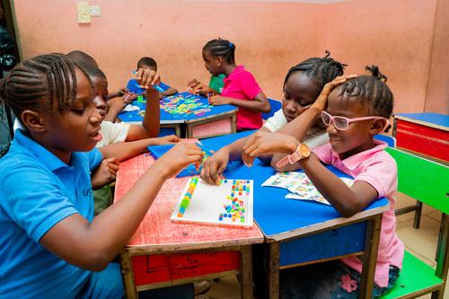 Pupils learning with educational toys