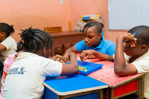 Primary pupils learning with educational toys