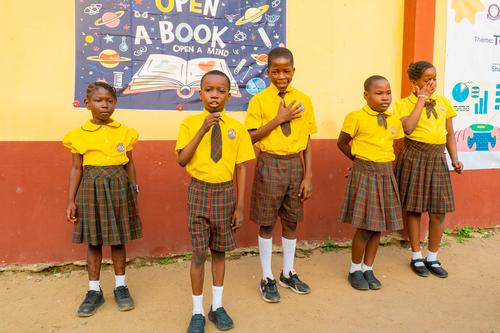 Primary pupils giving a presentation during the assembly