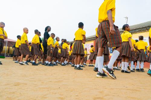 Backview of primary pupils on the assembly ground