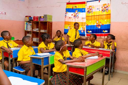 Primary pupils taking lessons in the classroom
